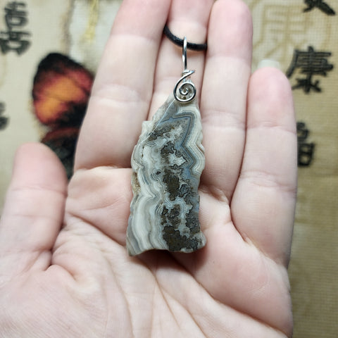 Fancy Crazy Lace Agate Pendant in Sterling Silver