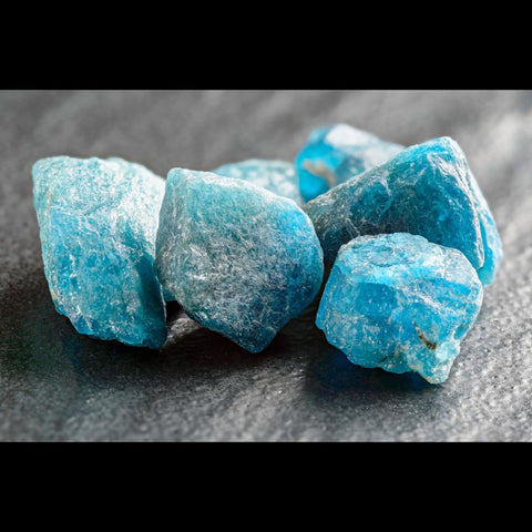 Raw chunks of blue apatite crystals