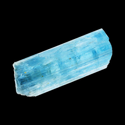 Clear long blue crystal on black background