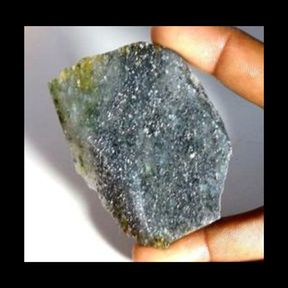 Gray sparkling black sunstone rough rock