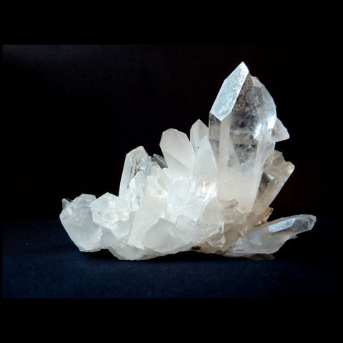 Clear quartz crystal six sided cluster with multiple points