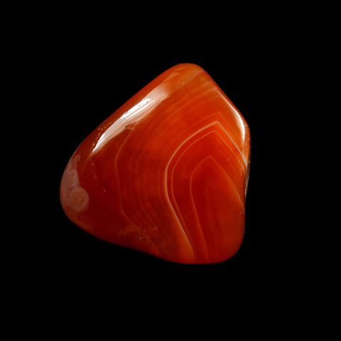 Bright flame orange stone with lighter and darker bands