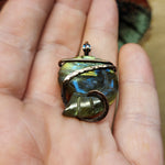 Carved Yellow Green Labradorite Ammonite Shell Pendant in Copper