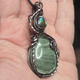 Lavendite and blue-flash labradorite pendant with handcrafted antiqued copper wire wrap.