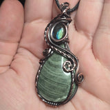 Lavendite and blue-flash labradorite pendant with handcrafted antiqued copper wire wrap.