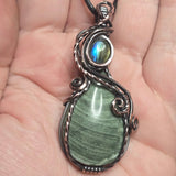 Lavendite and blue-flash labradorite pendant with handcrafted antiqued copper wire wrap.