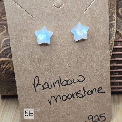 Star-shaped rainbow moonstone earrings on a brown card with 'Rainbow Moonstone' text.