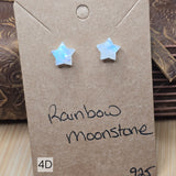 Star-shaped rainbow moonstone earrings on a brown card with 'Rainbow moonstone' text.