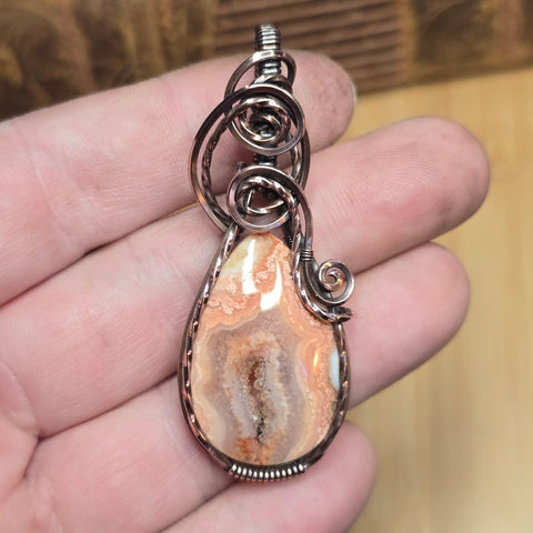 Crazy Lace Agate Potion Bottle Pendant | Copper Wire Wrap – Rock