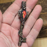 Antique number 1 skeleton key pendant with rainbow Aurora Opal and copper wire wrap.