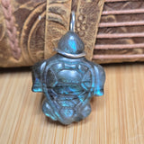 Sea Turtle pendant with a wooden background