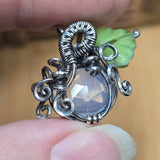 Lavender Moon Quartz pumpkin pendant wrapped in oxidized sterling silver with a green Czech glass leaf.