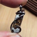 Meteorite slice with green crystals pendant in sterling silver