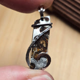 Meteorite slice with green crystals pendant in sterling silver