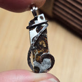Meteorite slice with green crystals pendant in sterling silver