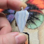 Blue Lace Agate Shield Pendant – Soft Power in Stone