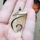 Translucent Petrified Wood Agate Pendant in Hammered Copper