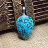 Stabilized Turquoise Teardrop Pendant – Spiderweb Matrix Blue Stone