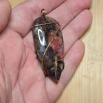 Pink Rhodonite Pendant – Forged Embrace in Rose Gold-Filled Wire - Rock Your World 