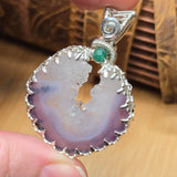 Purple Banded Agate Geode Pendant – Sterling Silver with Emerald Accent - Rock Your World 