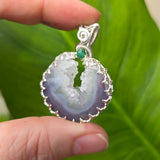 Purple Banded Agate Geode Pendant – Sterling Silver with Emerald Accent - Rock Your World 