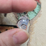 UV-Reactive Lavender Moon Quartz Pendant – 6ct Tension Set Sterling Silver
