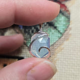 UV-Reactive Lavender Moon Quartz Pendant – 6ct Tension Set Sterling Silver