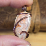 Crazy Lace Agate Pendant with Geode Window – Copper Setting