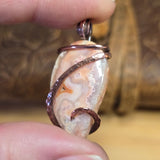 Crazy Lace Agate Pendant with Geode Window – Copper Setting
