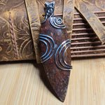 Utah Dinosaur Bone Pendant – Fossil Fire in Sterling Silver