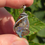 Boulder Opal Pendant with Blue Fire – Sterling Silver Forged Embrace