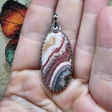 Natural Pink and Black Rhodochrosite Pendant in Sterling Silver