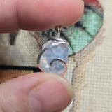 UV-Reactive Lavender Moon Quartz Pendant – 6ct Tension Set Sterling Silver