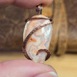 Crazy Lace Agate Pendant with Geode Window – Copper Setting