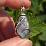 Boulder Opal Pendant with Blue Fire – Sterling Silver Forged Embrace