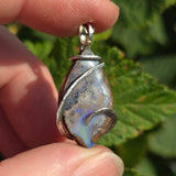 Boulder Opal Pendant with Blue Fire – Sterling Silver Forged Embrace