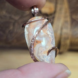 Crazy Lace Agate Pendant with Geode Window – Copper Setting