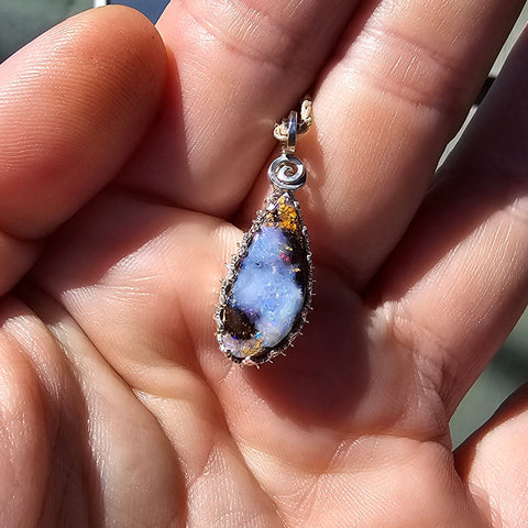 Shimmering Boulder Opal Pendant in Sterling Silver