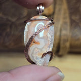 Crazy Lace Agate Pendant with Geode Window – Copper Setting