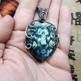 Carved Ocean Blue Labradorite Lion Pendant in Sterling Silver