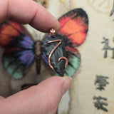 Basenite Arrowhead Pendant – Copper Wrapped Stone
