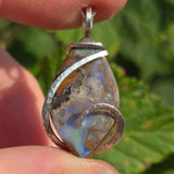 Boulder Opal Pendant with Blue Fire – Sterling Silver Forged Embrace