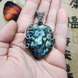 Carved Ocean Blue Labradorite Lion Pendant in Sterling Silver