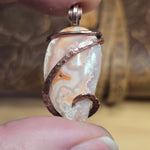 Crazy Lace Agate Pendant with Geode Window – Copper Setting