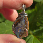 Boulder Opal Pendant with Blue Fire – Sterling Silver Forged Embrace