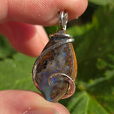 Boulder Opal Pendant with Blue Fire – Sterling Silver Forged Embrace