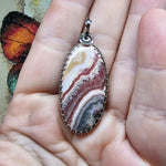 Natural Pink and Black Rhodochrosite Pendant in Sterling Silver