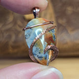 Flaming Common Opal Pendant Marcasite Inclusions - Copper Wrapped
