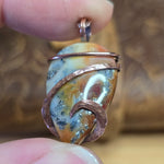 Flaming Common Opal Pendant Marcasite Inclusions - Copper Wrapped