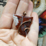 Petrified Wood Plume Agate Pendant in Hammered Copper